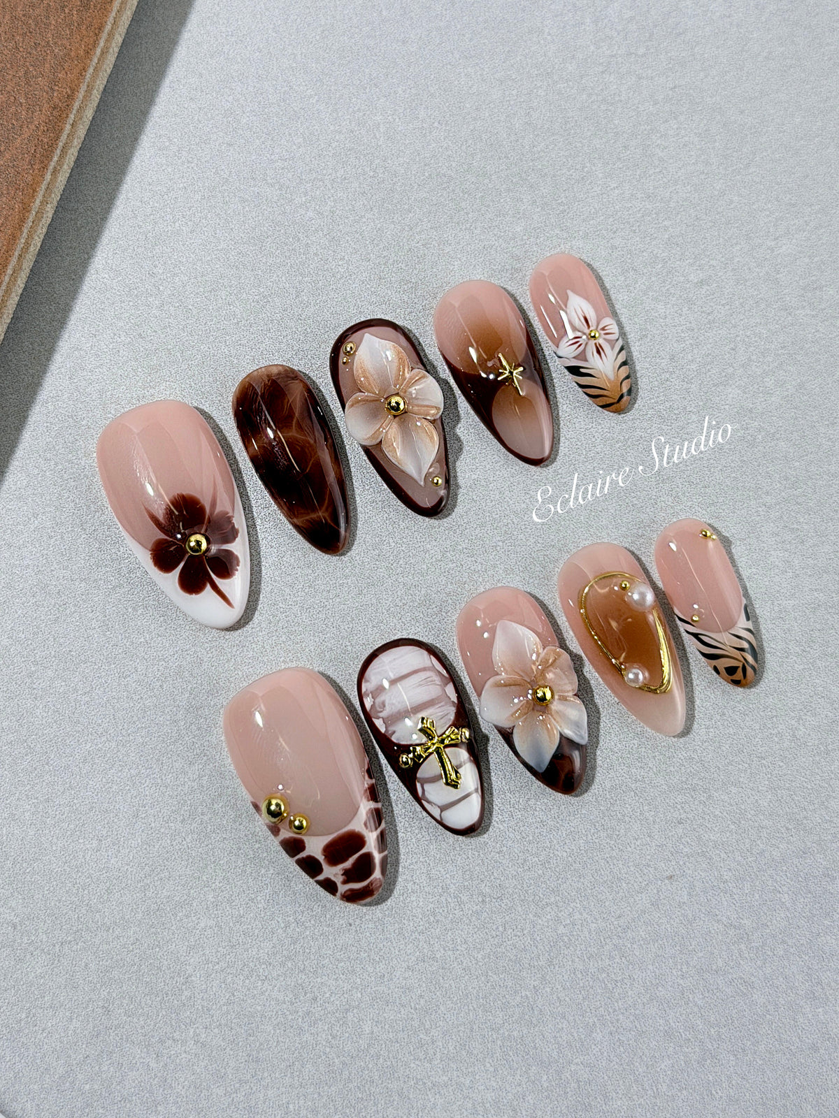 Petal Locket almond press-on nails with ivory 3D flowers, tortoiseshell, animal-print French tips and pearls – Éclaire Studio