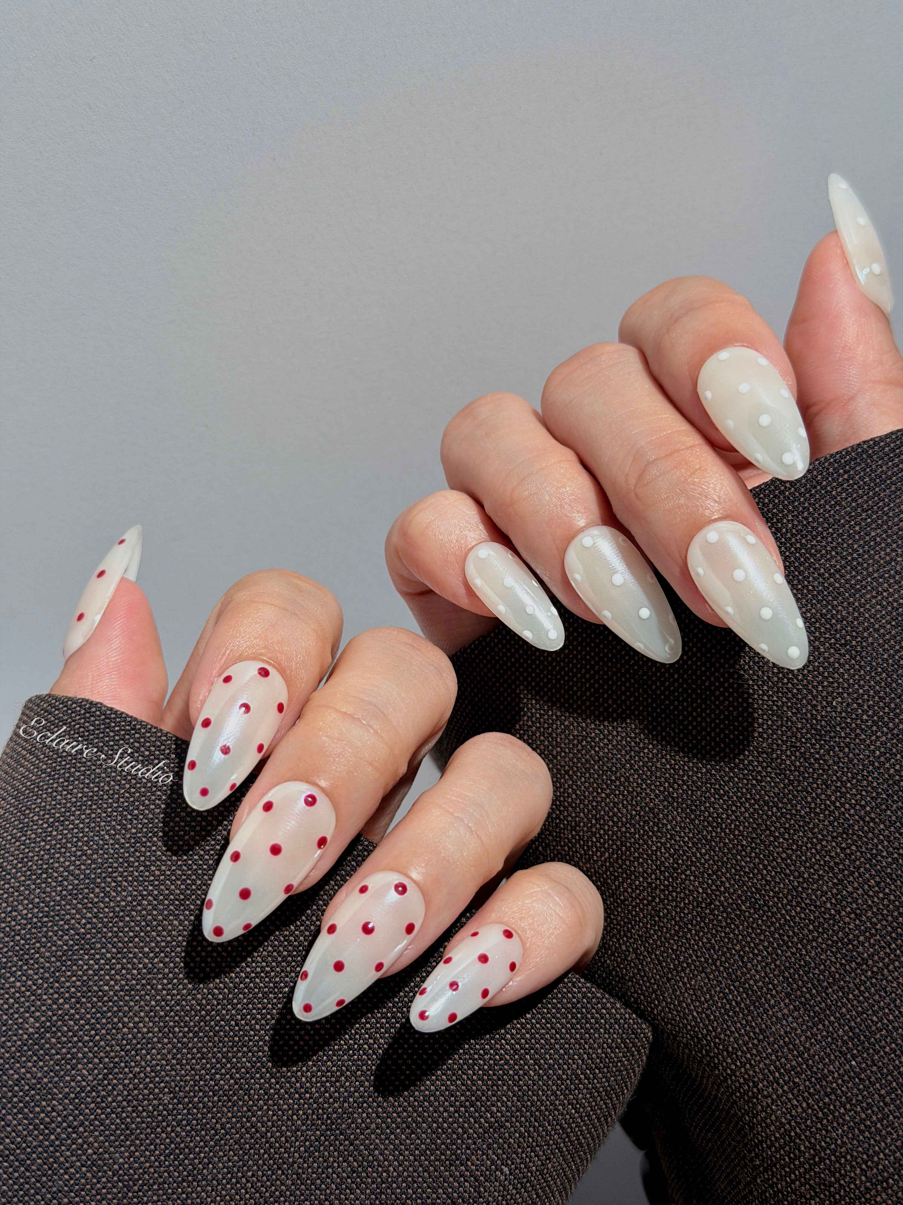Spritz glazed pearlescent press-on nails with hand-placed polka dots – Éclaire Studio