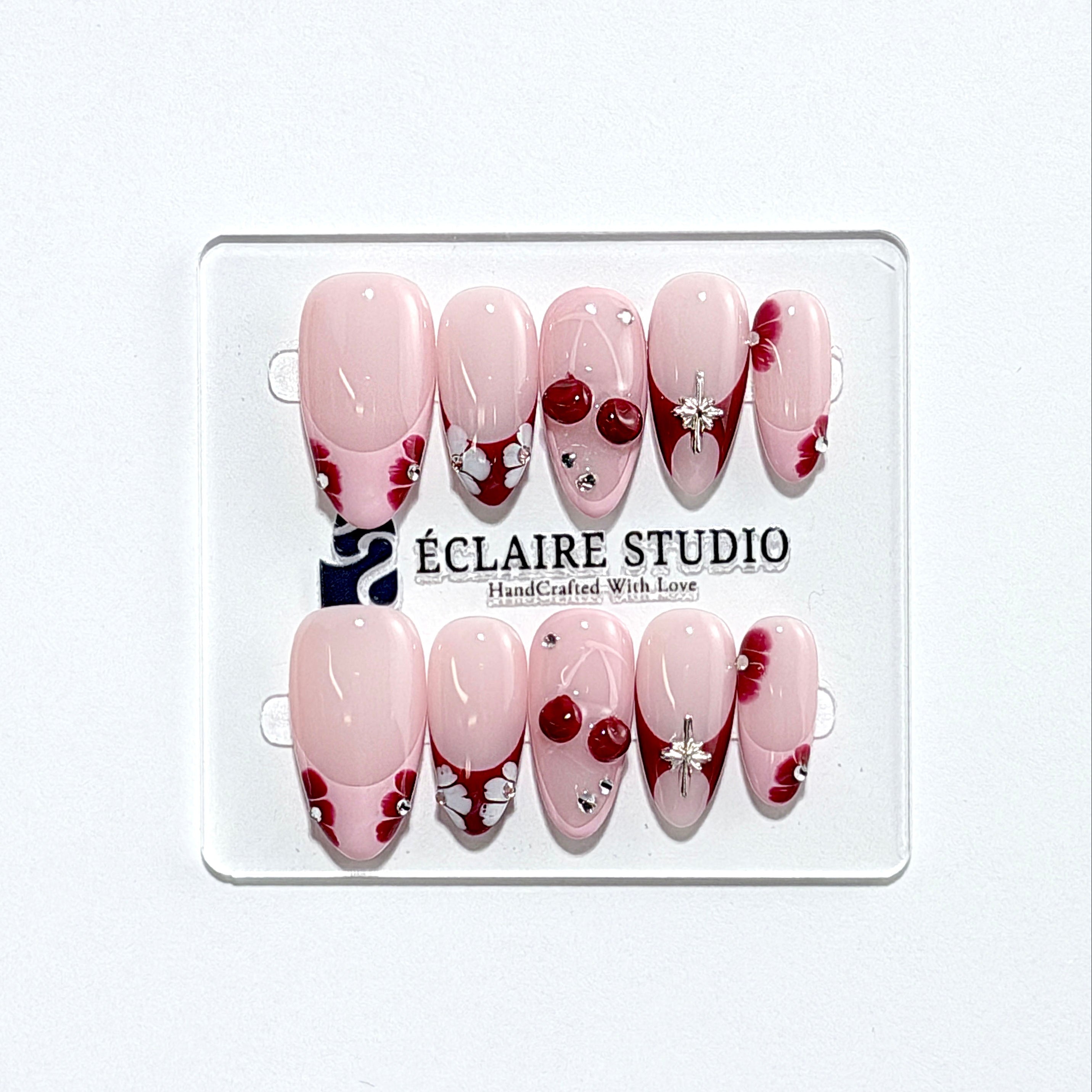 Cherry Kiss pink French press-on nails with wine florals, glossy 3D cherries and silver charms – Éclaire Studio