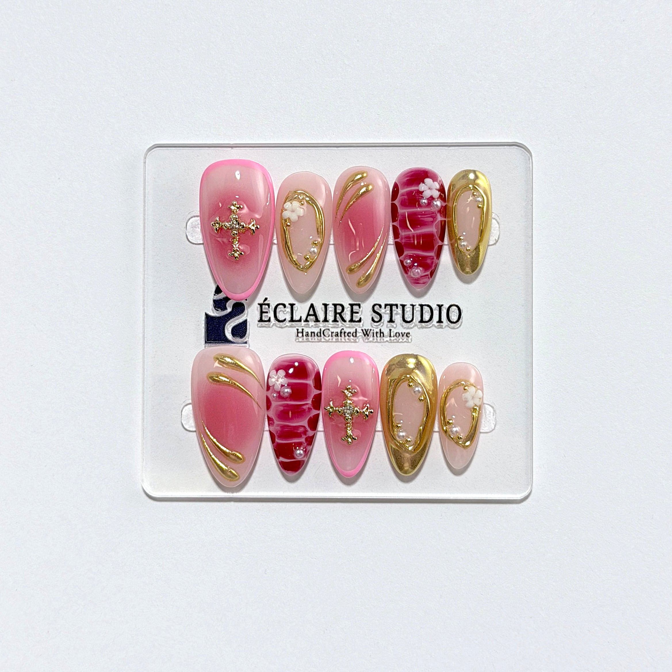 Strawberry Latte red ombré press-on nails with molten gold frames and floral accents – Éclaire Studio