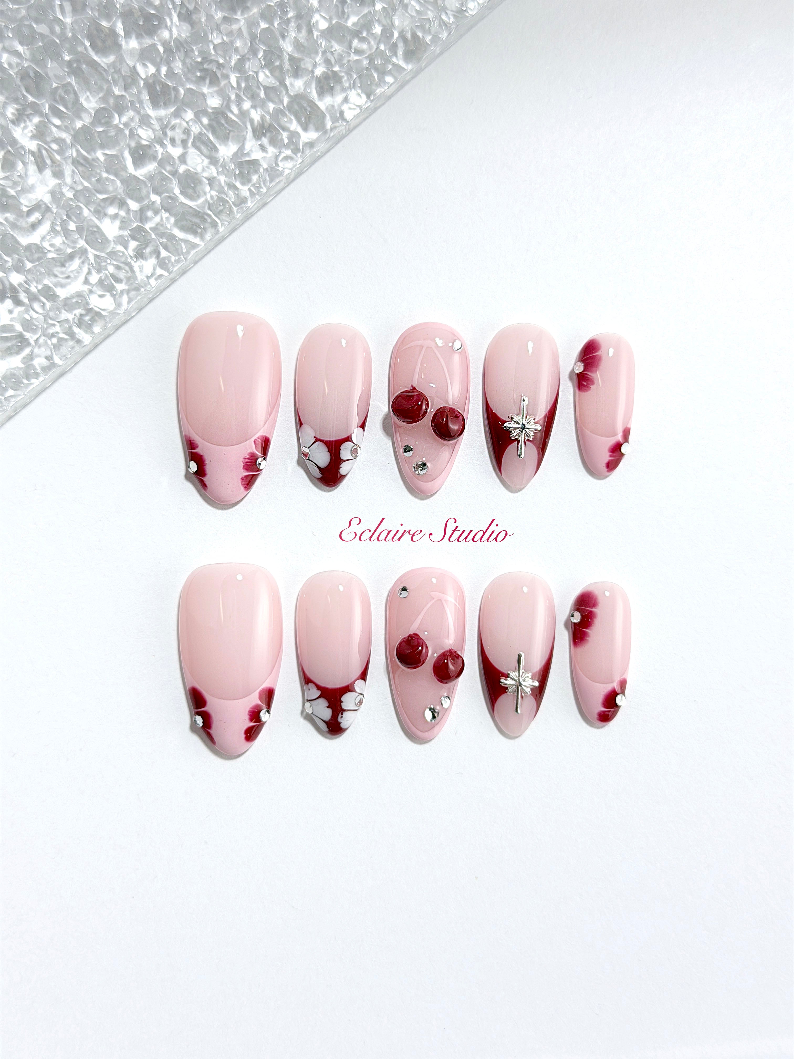 Cherry Kiss pink French press-on nails with wine florals, glossy 3D cherries and silver charms – Éclaire Studio