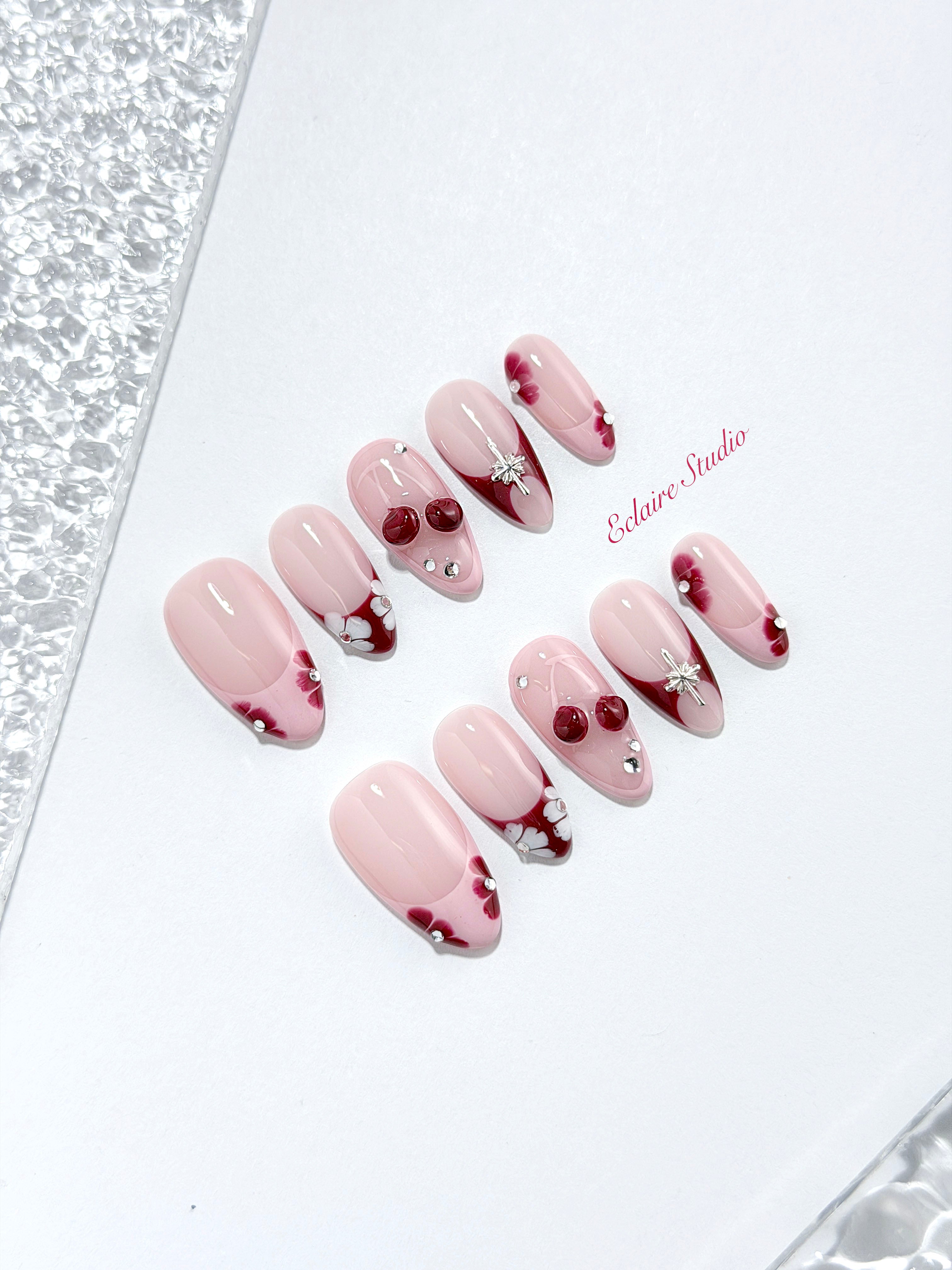 Cherry Kiss pink French press-on nails with wine florals, glossy 3D cherries and silver charms – Éclaire Studio