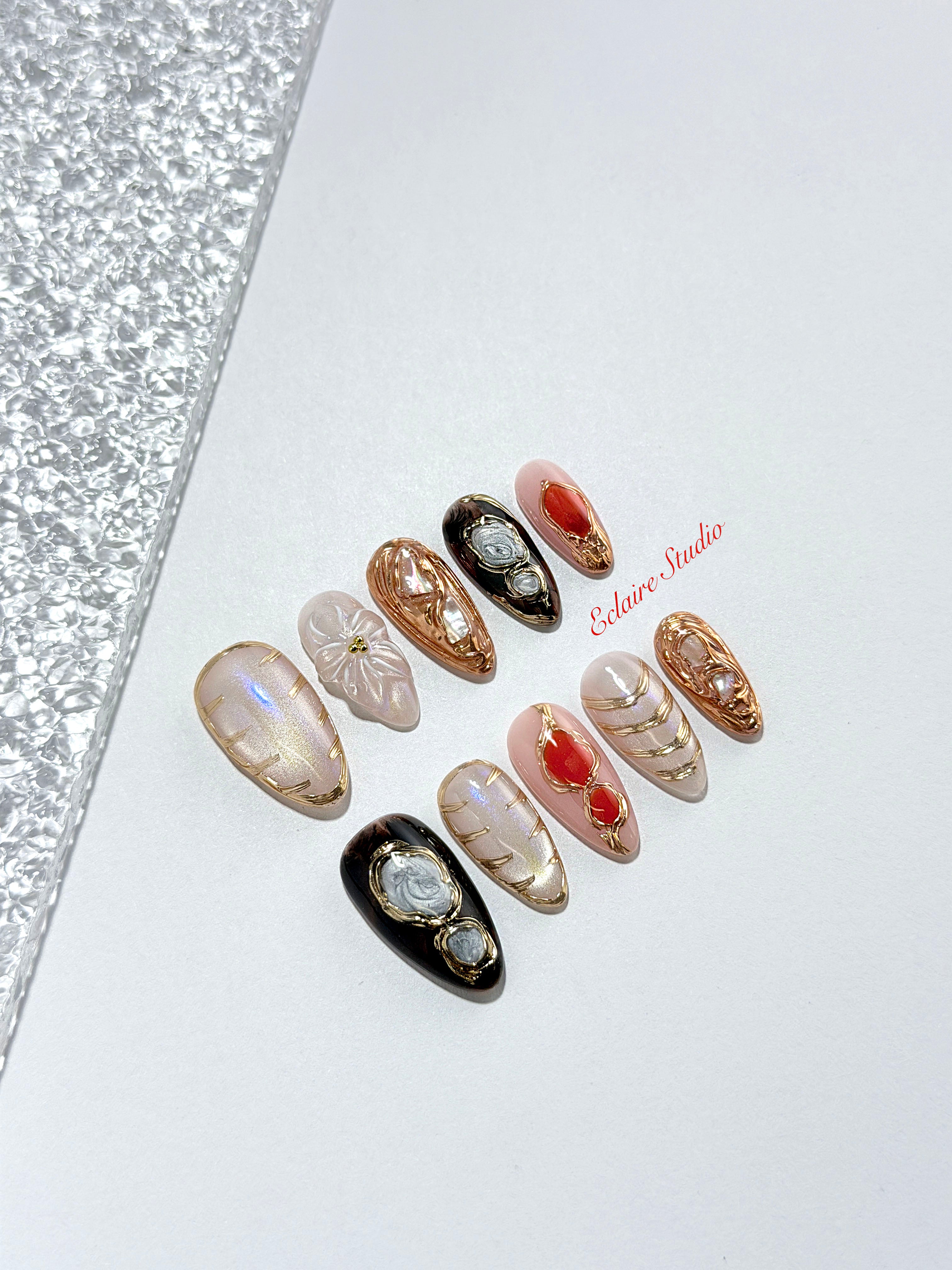 Treasure pearlescent cat-eye press-on nails with gold-bezeled amber, coral, agate and abalone inlays – Éclaire Studio