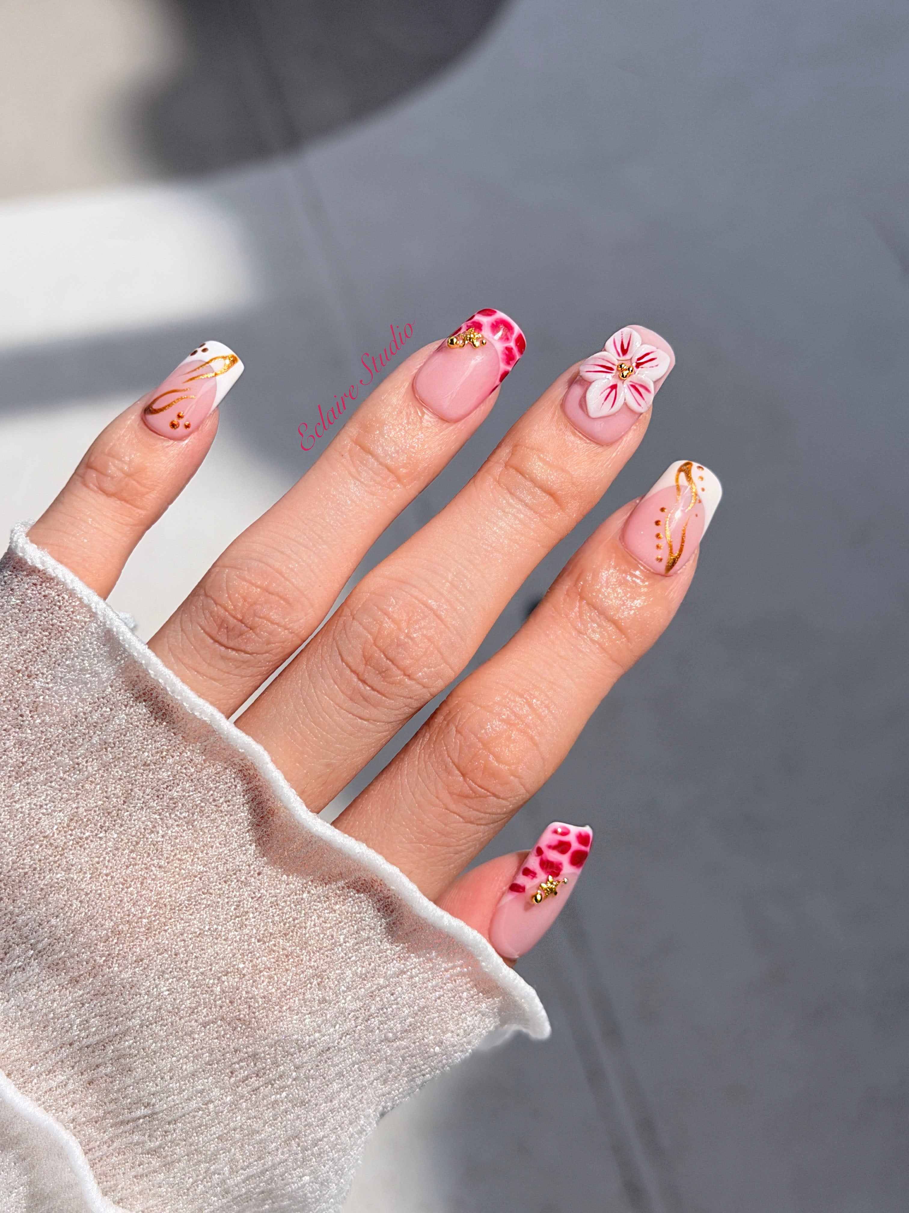 Marbella square press-on nails with wine watercolor French tips, gold swirls, starfish charms and 3D lily – Éclaire Studio