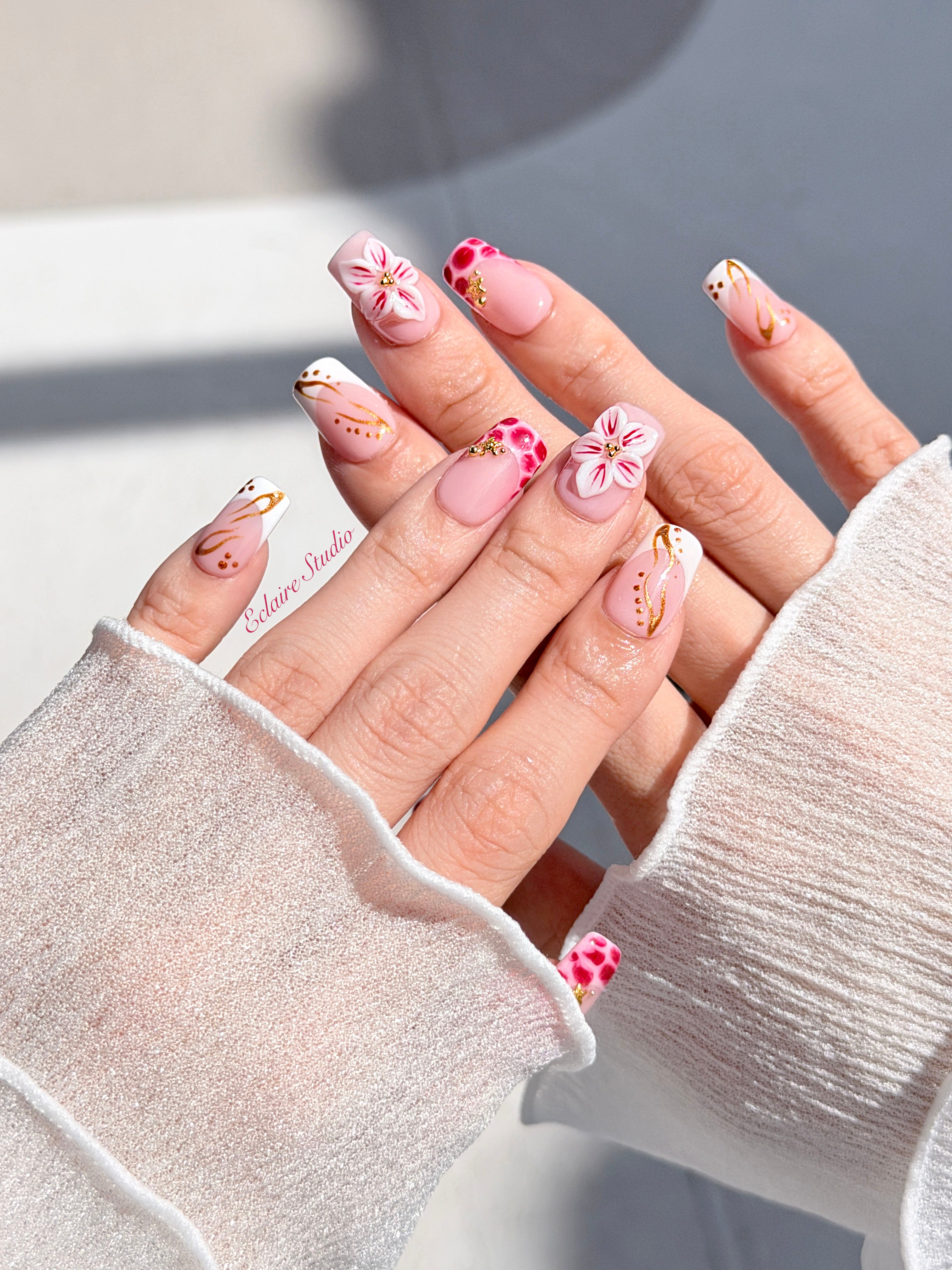 Marbella square press-on nails with wine watercolor French tips, gold swirls, starfish charms and 3D lily – Éclaire Studio