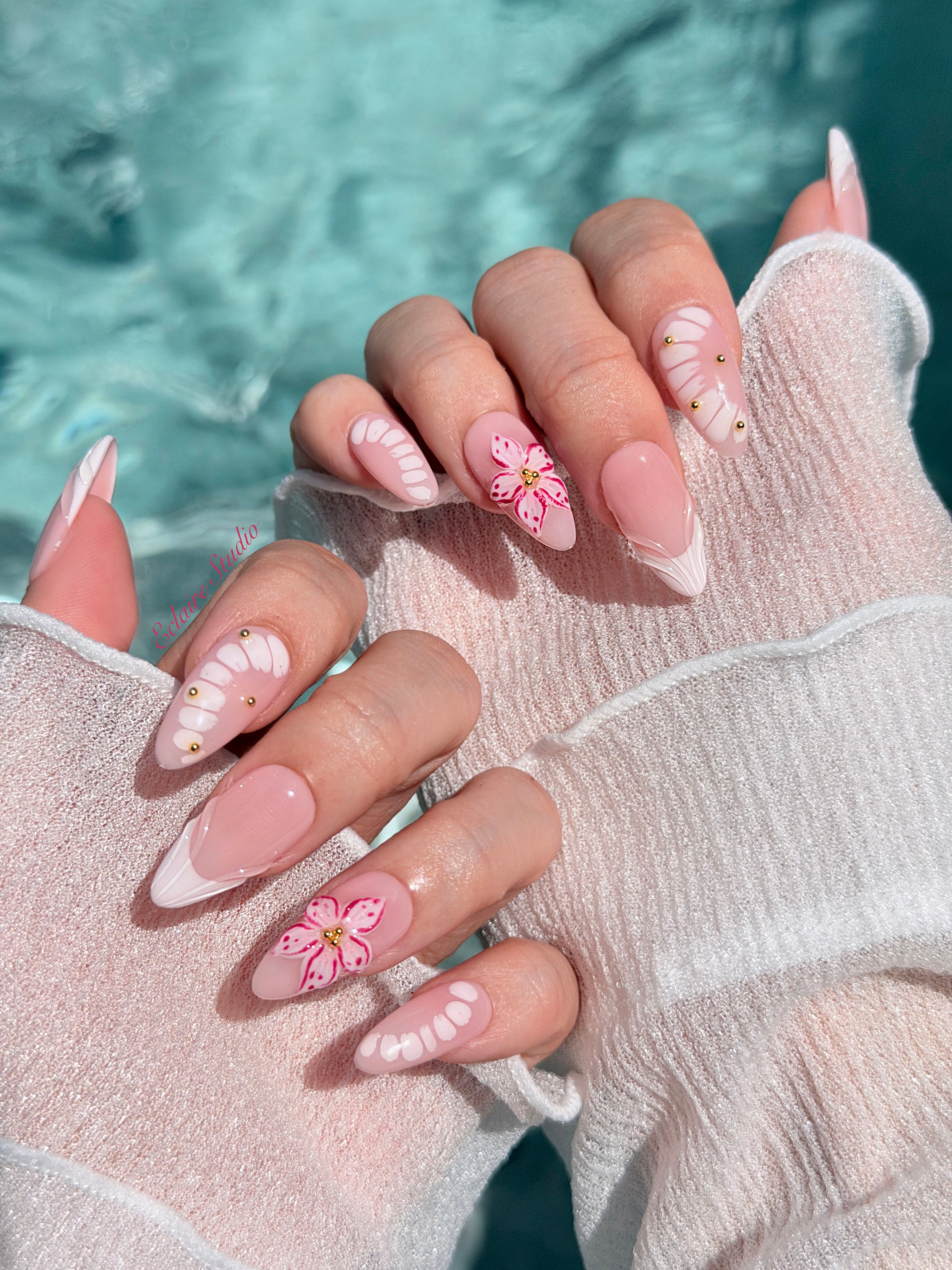Belle Rose almond press-on nails with milky pink French tips, hand-painted petals and 3D floral accent – Éclaire Studio