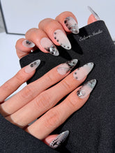oid Signal press-on nails — a black and grey smoky marble nail design with cyber-inspired line art and glossy onyx studs. Handmade high-fashion nails by Éclaire Nail Studio.”
