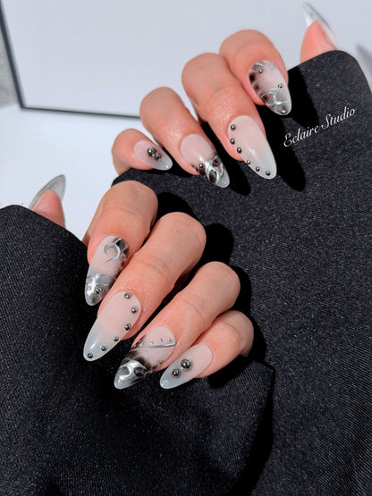 oid Signal press-on nails — a black and grey smoky marble nail design with cyber-inspired line art and glossy onyx studs. Handmade high-fashion nails by Éclaire Nail Studio.”