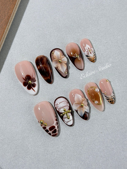 Petal Locket almond press-on nails with ivory 3D flowers, tortoiseshell, animal-print French tips and pearls – Éclaire Studio