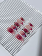 Plum and blush ombré nails with star accents and abstract black outlines — Sugar Plum Fairy–inspired.