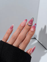 Plum and blush ombré nails with star accents and abstract black outlines — Sugar Plum Fairy–inspired.