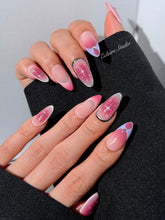 Plum and blush ombré nails with star accents and abstract black outlines — Sugar Plum Fairy–inspired.