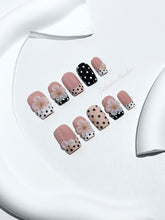 Eclaire Nail Studio 3D Floral Polka dot pink base with alternating black and white polka dot French tips, and hand-sculpted 3D frosted white flowers with gold bead centers, Medium Square