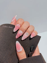 Luxury press-on nails featuring a soft blush pink ombre base with white French tips, a translucent 3D jellyfish, a sculpted pink starfish, and a clear 3D glass flower with a pearl center.