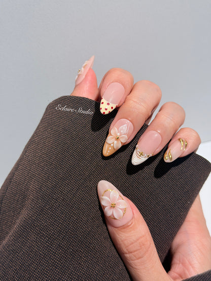 Madeleine press-on nails with 3D white florals on a toasted-cream base – Éclaire Studio