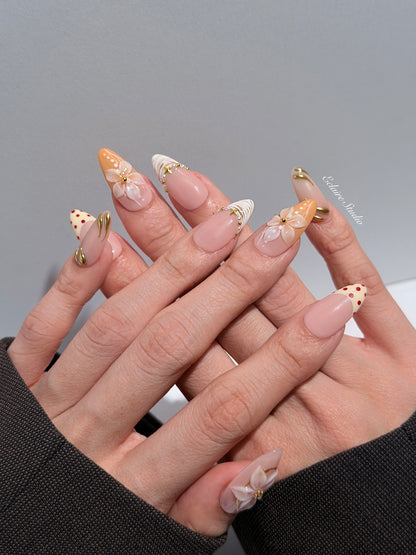 Madeleine press-on nails with 3D white florals on a toasted-cream base – Éclaire Studio