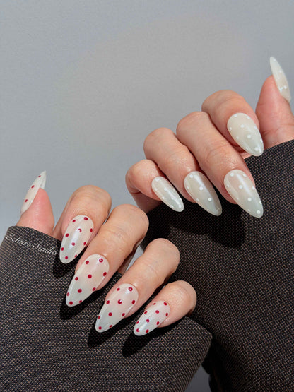 Spritz glazed pearlescent press-on nails with hand-placed polka dots – Éclaire Studio