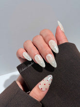 Spritz glazed pearlescent press-on nails with hand-placed polka dots – Éclaire Studio