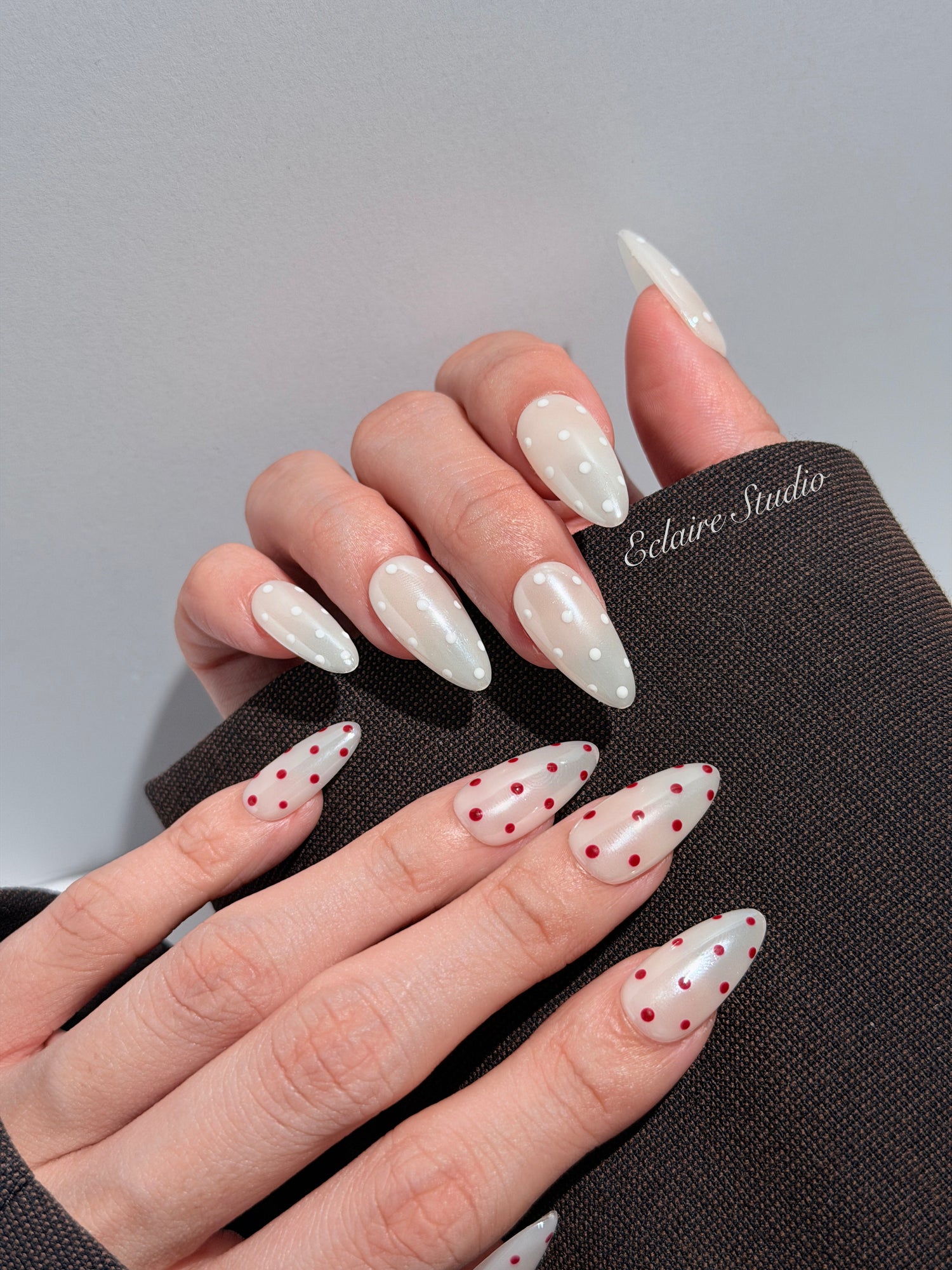 Spritz glazed pearlescent press-on nails with hand-placed polka dots – Éclaire Studio