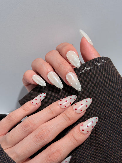 Spritz glazed pearlescent press-on nails with hand-placed polka dots – Éclaire Studio