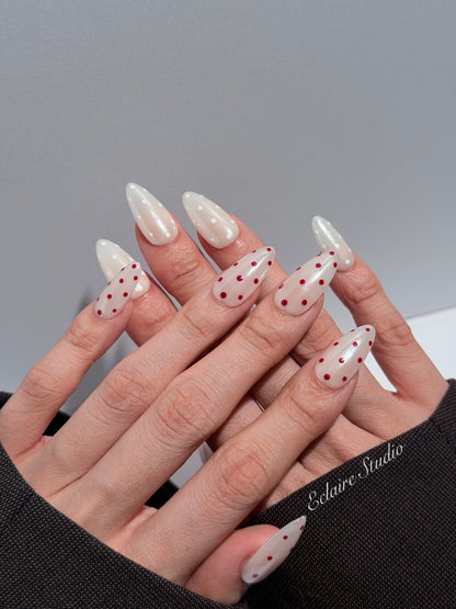 Spritz glazed pearlescent press-on nails with hand-placed polka dots – Éclaire Studio