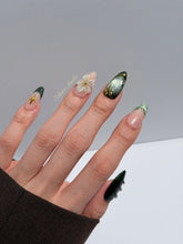 Bali Escape almond press-on nails with emerald cat-eye shimmer, 3D frosted flowers and gold accents – Éclaire Studio