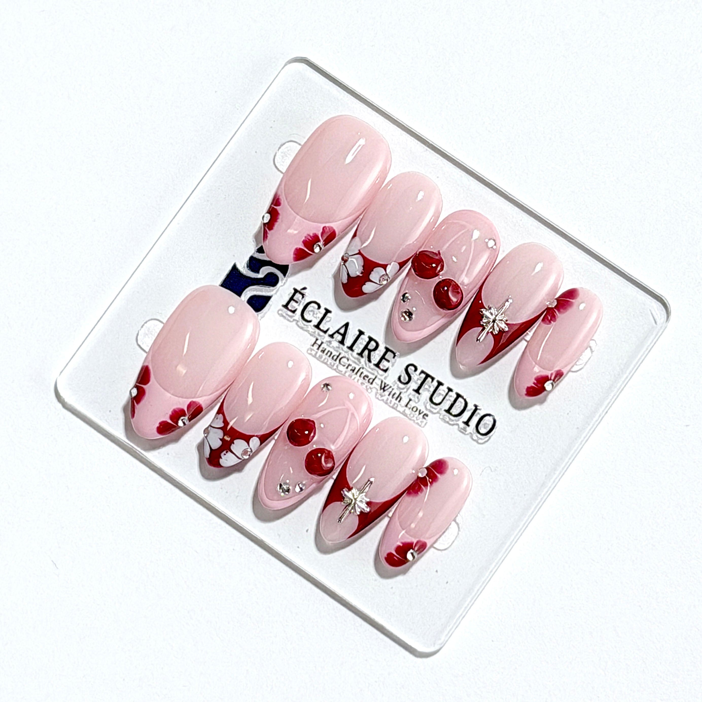 Cherry Kiss pink French press-on nails with wine florals, glossy 3D cherries and silver charms – Éclaire Studio