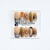 Dune caramel and espresso press-on nails with gold chrome wave, starbursts and opal gem – Éclaire Studio