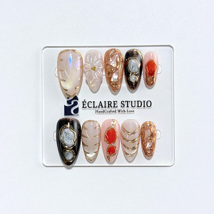 Treasure pearlescent cat-eye press-on nails with gold-bezeled amber, coral, agate and abalone inlays – Éclaire Studio