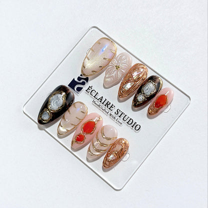Treasure pearlescent cat-eye press-on nails with gold-bezeled amber, coral, agate and abalone inlays – Éclaire Studio