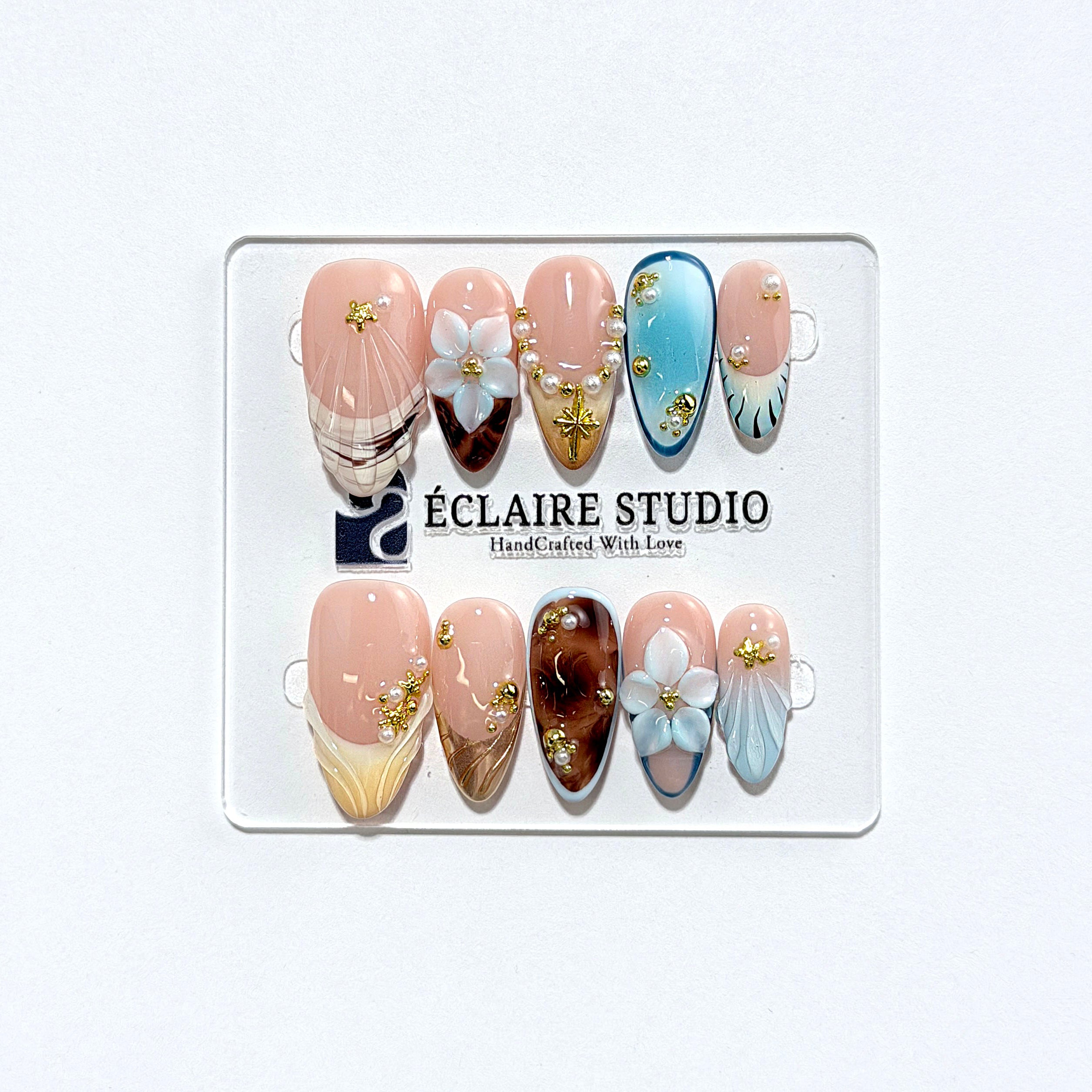 Seabreeze blue-to-amber ombré press-on nails with 3D flowers, pearls and shell French tips – Éclaire Studio