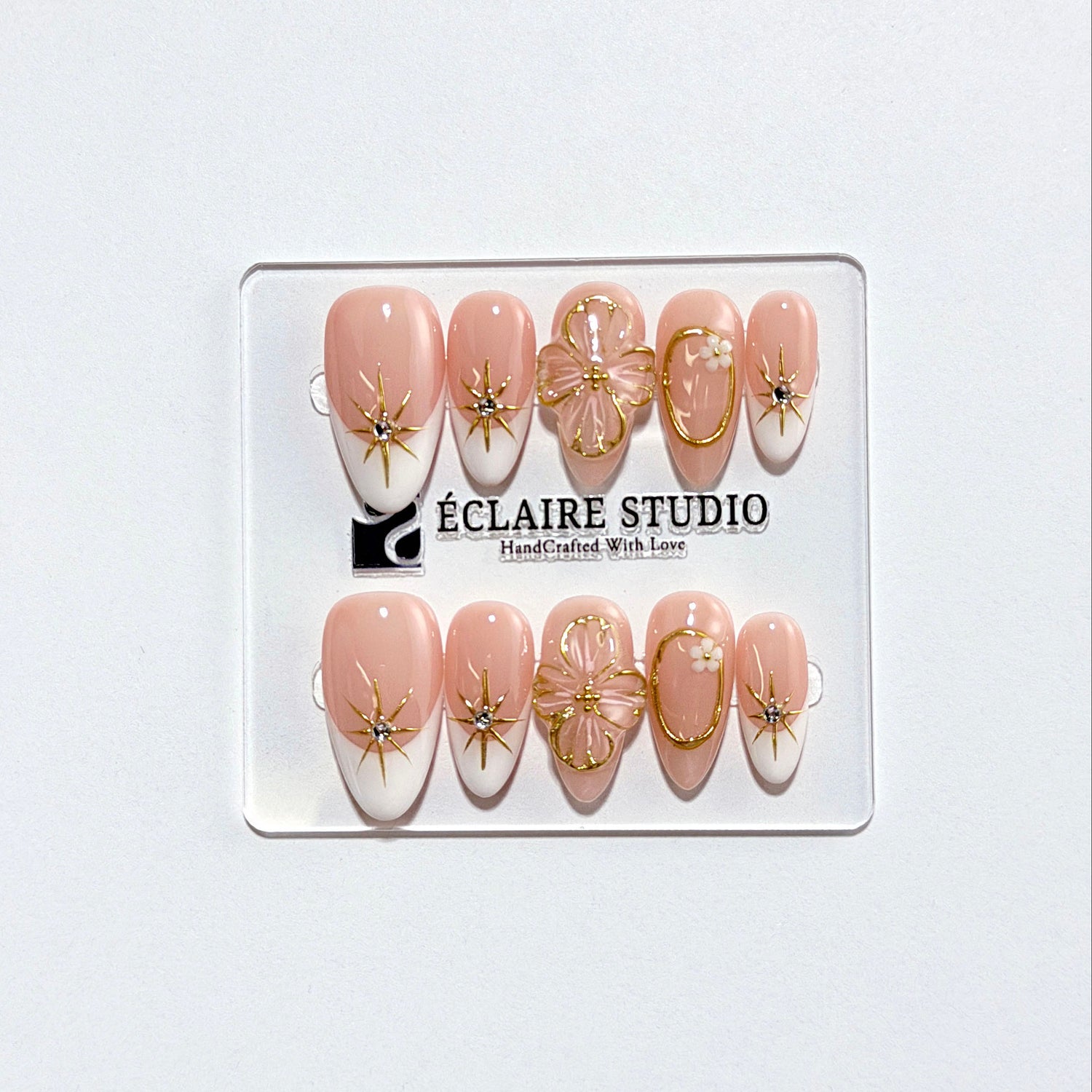 Golden Fleur white French tip press-on nails with 3D cherry blossom florals and gold starbursts – Éclaire Studio
