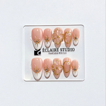 Golden Fleur white French tip press-on nails with 3D cherry blossom florals and gold starbursts – Éclaire Studio
