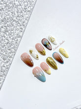 Horizon mixed-tone press-on nails in brown, butter yellow, sky blue and cream with gold chrome wave – Éclaire Studio