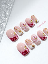 Marbella square press-on nails with wine watercolor French tips, gold swirls, starfish charms and 3D lily – Éclaire Studio