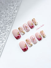 Marbella square press-on nails with wine watercolor French tips, gold swirls, starfish charms and 3D lily – Éclaire Studio