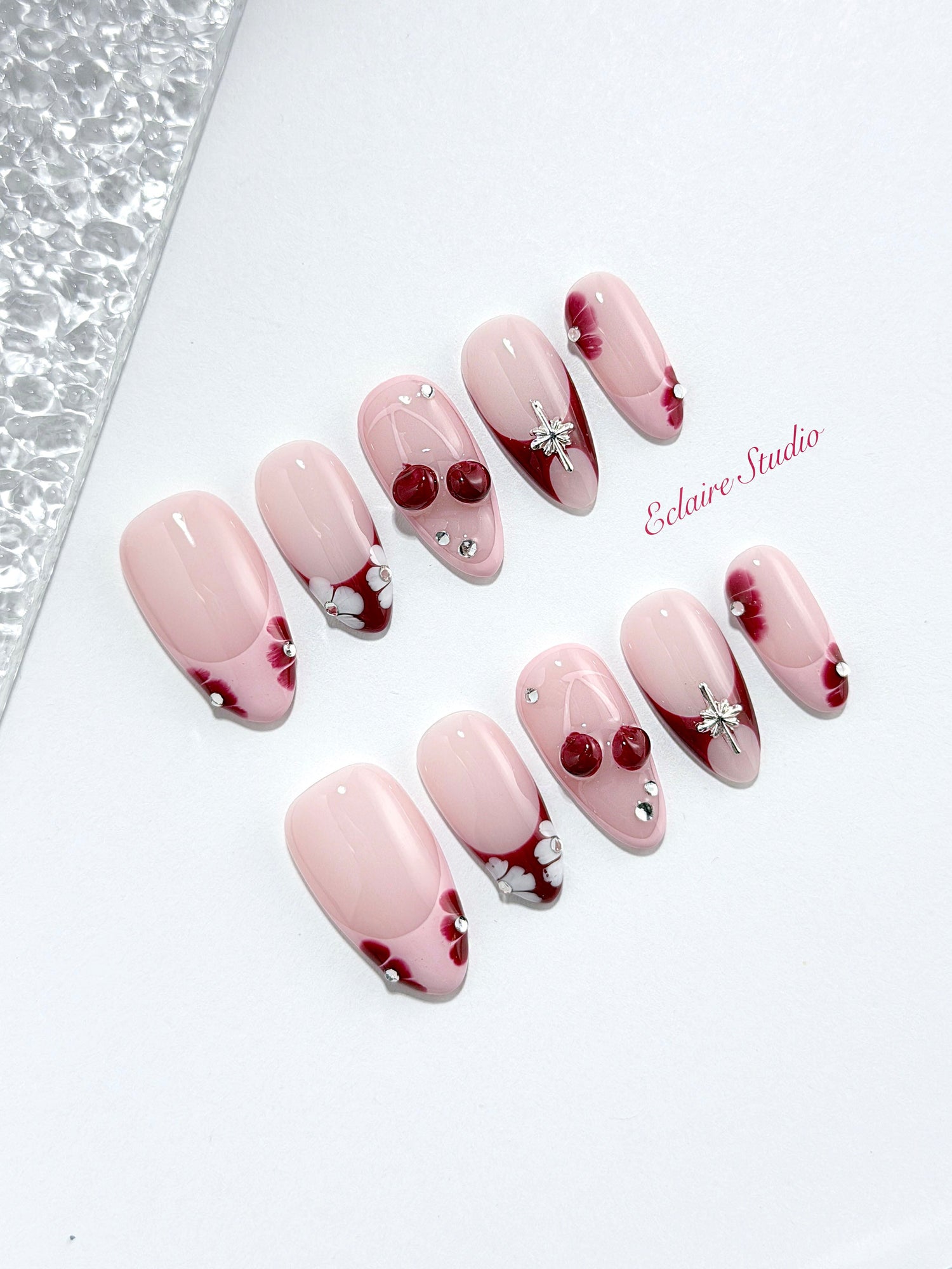Cherry Kiss pink French press-on nails with wine florals, glossy 3D cherries and silver charms – Éclaire Studio