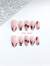 Cherry Kiss pink French press-on nails with wine florals, glossy 3D cherries and silver charms – Éclaire Studio