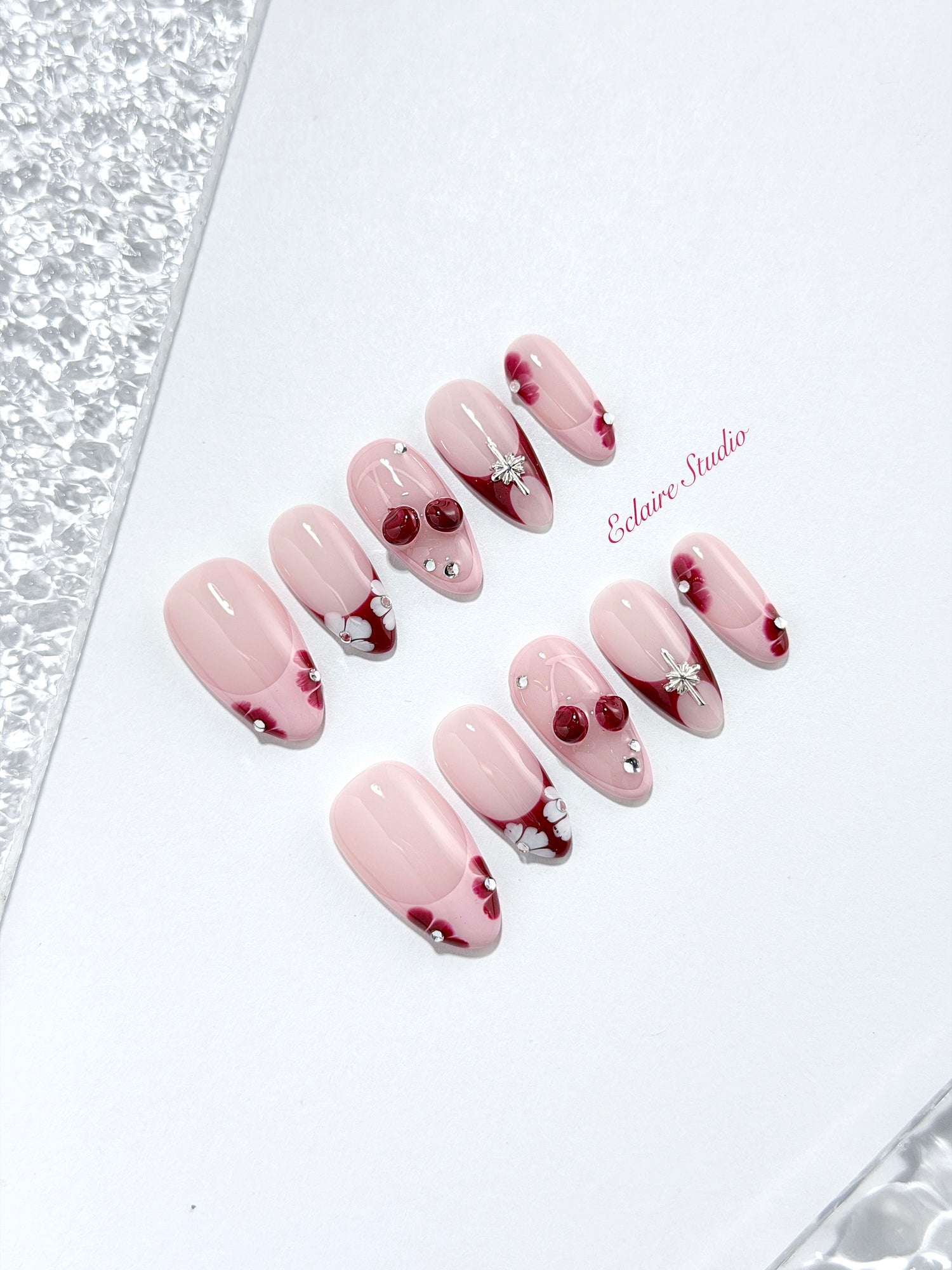 Cherry Kiss pink French press-on nails with wine florals, glossy 3D cherries and silver charms – Éclaire Studio