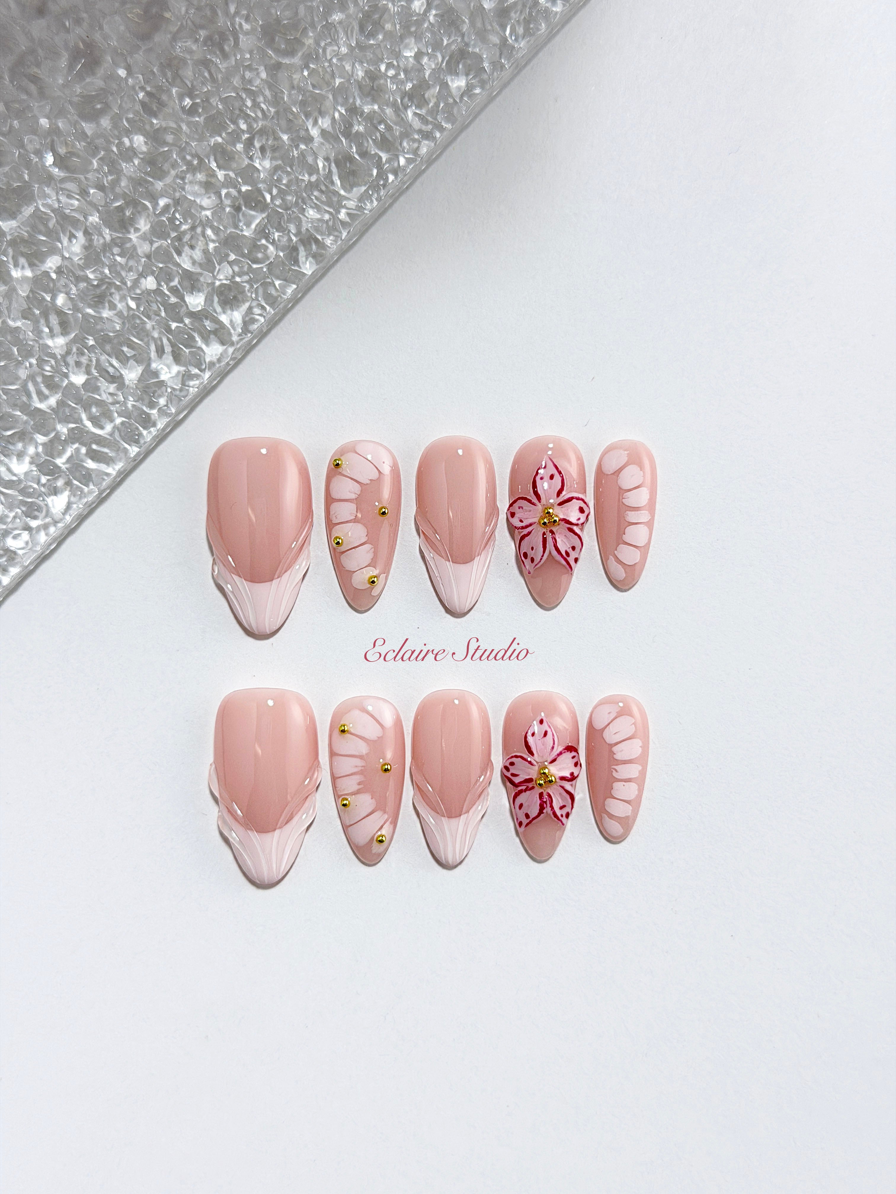 Belle Rose almond press-on nails with milky pink French tips, hand-painted petals and 3D floral accent – Éclaire Studio