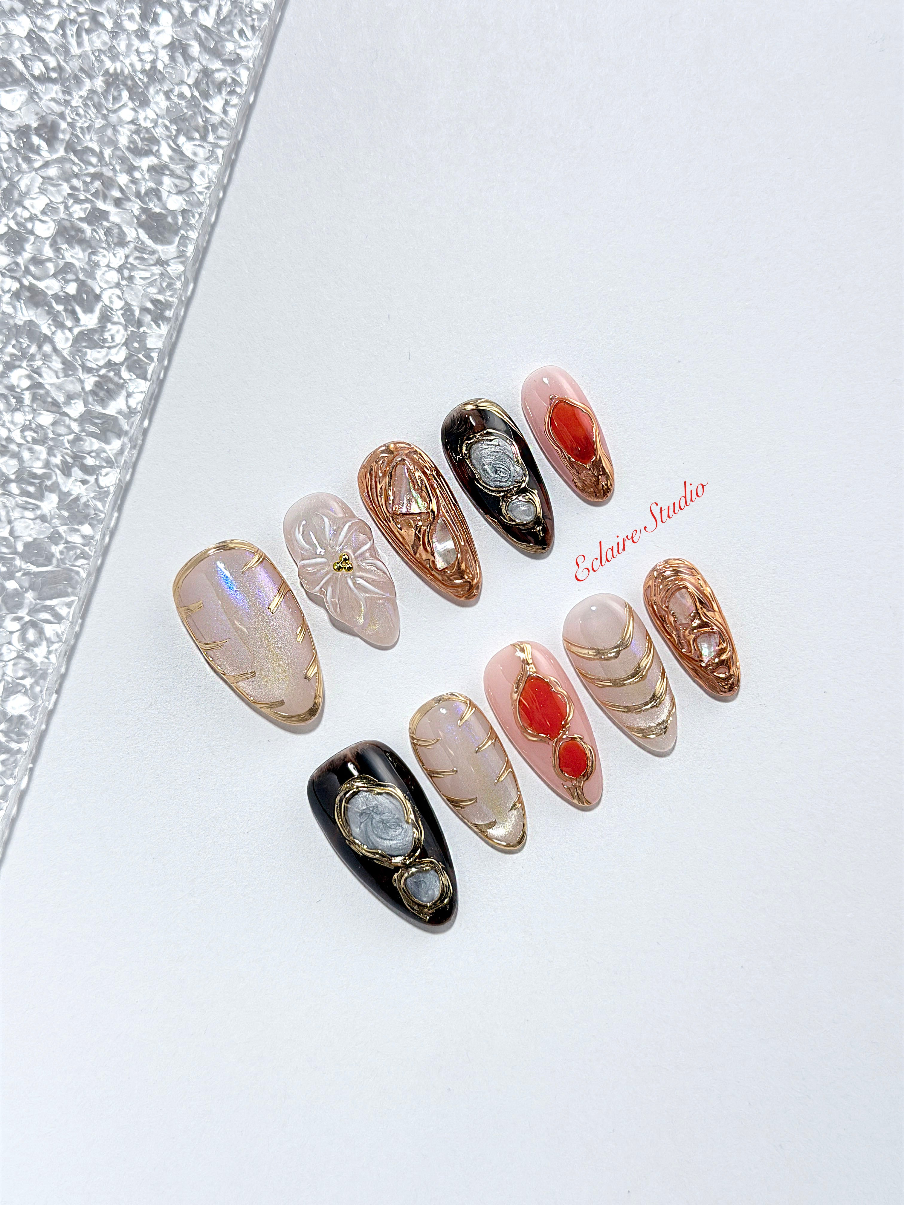 Treasure pearlescent cat-eye press-on nails with gold-bezeled amber, coral, agate and abalone inlays – Éclaire Studio