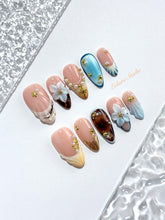 Seabreeze blue-to-amber ombré press-on nails with 3D flowers, pearls and shell French tips – Éclaire Studio