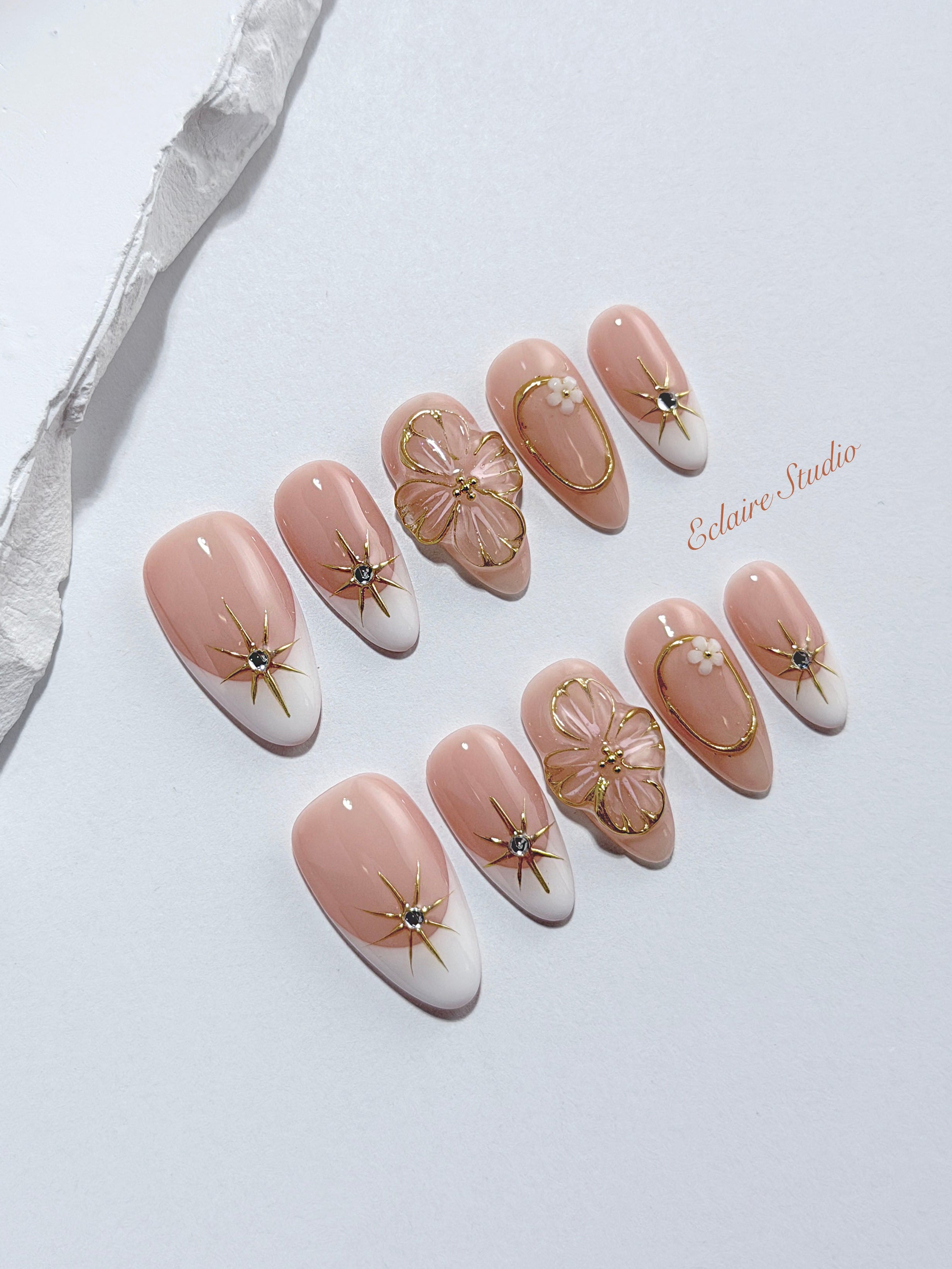 Golden Fleur white French tip press-on nails with 3D cherry blossom florals and gold starbursts – Éclaire Studio