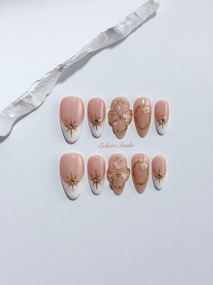 Golden Fleur white French tip press-on nails with 3D cherry blossom florals and gold starbursts – Éclaire Studio