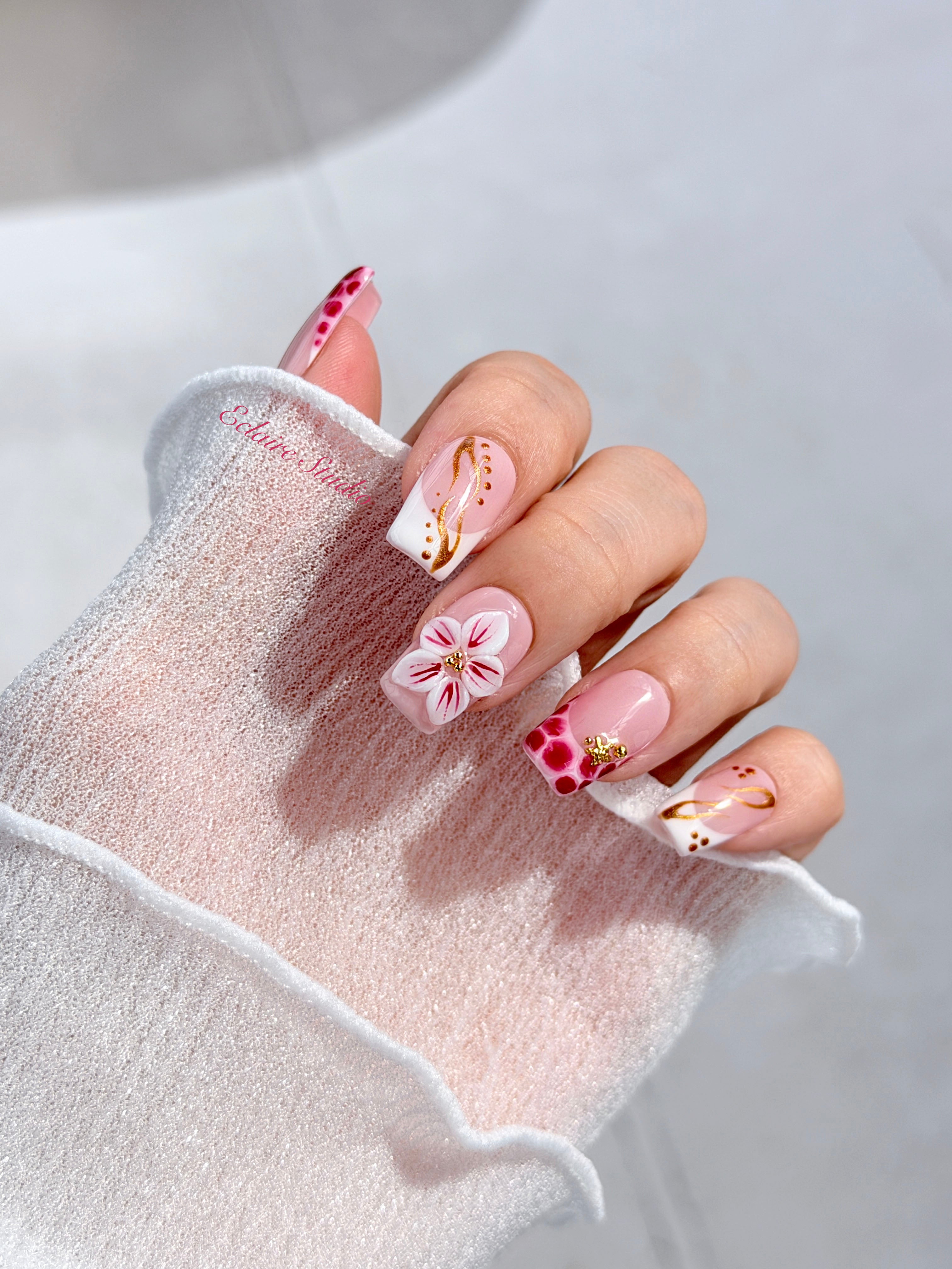Marbella square press-on nails with wine watercolor French tips, gold swirls, starfish charms and 3D lily – Éclaire Studio