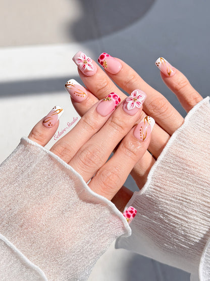 Marbella square press-on nails with wine watercolor French tips, gold swirls, starfish charms and 3D lily – Éclaire Studio