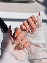 Dune caramel and espresso press-on nails with gold chrome wave, starbursts and opal gem – Éclaire Studio
