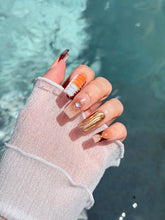Dune caramel and espresso press-on nails with gold chrome wave, starbursts and opal gem – Éclaire Studio
