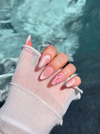 Belle Rose almond press-on nails with milky pink French tips, hand-painted petals and 3D floral accent – Éclaire Studio