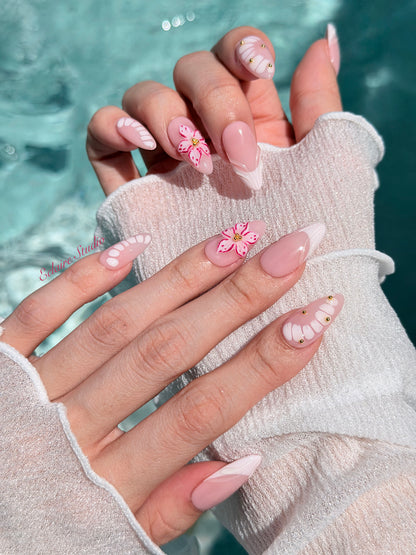 Belle Rose almond press-on nails with milky pink French tips, hand-painted petals and 3D floral accent – Éclaire Studio